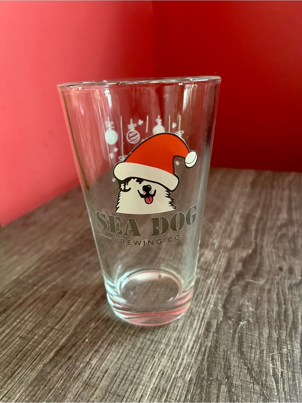 Sea Dog Brewing Co. Pint Glass with Holiday Design - Red Hat
